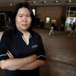 Ye Qing Wei, a housekeeper at Sheraton Boston, has seen her schedule disrupted by green programs that encourage people to opt out of housekeeping service in exchange for points and meal coupons. 