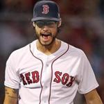 Boston, MA: 5-29-18: Red Sox pitcher Joe Kelly reacts after striking out the Blue Jays Kevin Pillar to end the top of the seventh inning. The Boston Red Sox hosted the Toronto Blue Jays in an MLB baseball game at Fenway Park. (Jim Davis/Globe Staff)