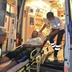 Paramedics carried a man rescued from a capsized boat off Cyprus as he was brought to a hospital in southern Turkey.