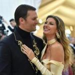 Tom Brady (L) and Gisele Brundchen arrive for the 2018 Met Gala on May 7, 2018, at the Metropolitan Museum of Art in New York. / AFP PHOTO / Angela WEISSANGELA WEISS/AFP/Getty Images