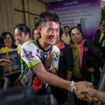Ekkapol Chantawong from the 'Wild Boars' Thai soccer team shook hands with followers on Wednesday after the boys? first press conference since being rescued from a cave in northern Thailand.