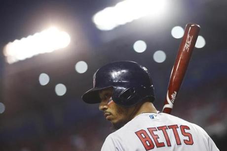 Boston Red Sox's Mookie Betts takes the field before a baseball game against the Toronto Blue Jays Saturday, July 14, 2018, in Boston. (AP Photo/Winslow Townson)

