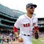 Boston Red Sox's Mookie Betts takes the field before a baseball game against the Toronto Blue Jays Saturday, July 14, 2018, in Boston. (AP Photo/Winslow Townson)