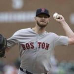 Boston Red Sox starting pitcher Chris Sale throws during the third inning of a baseball game against the Detroit Tigers, Sunday, July 22, 2018, in Detroit. (AP Photo/Carlos Osorio)