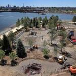 The grounds of the Encore Boston Harbor casino and hotel are a garden in the making. The work to build a riverwalk on the former industrial site is well underway.