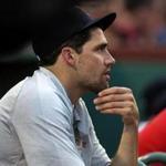 Boston, MA - 7/26/2018 - (1st inning) ***PLEASE CHECK IF ID IS CORRECT!!! Nathan Eovaldi, the newest Red Sox pitcher watches from the Sox dugout. The Boston Red Sox host the Minnesota Twins in the first game of a four game series at Fenway Park. - (Barry Chin/Globe Staff), Section: Sports, Reporter: Peter Abraham, Topic: 27Red Sox-Twins, LOID: 8.4.2659852198.