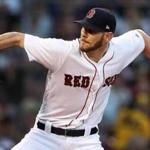 Boston, MA: 7-11-18: Red Sox starting pitcher Chris Sale firess a pitch. The Boston Red Sox hosted the Texas Rangers in regular season MLB baseball game at Fenway Park. (Jim Davis/Globe Staff)