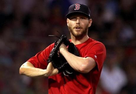 Boston, MA - 7/27/2018 - (4th inning) Boston Red Sox starting pitcher Chris Sale (41) reacts while loading the bases during the fourth inning. Sale escaped the jam without allowing a run. The Boston Red Sox host the Minnesota Twins in the second of a four game series at Fenway Park. - (Barry Chin/Globe Staff), Section: Sports, Reporter: Peter Abraham, Topic: 28Red Sox-Twins, LOID: 8.4.2664046326.

