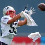Foxborough-7/28/2018 The Patriots held their third day of training camp at the Gillette Stadium facility. During a passing drill in which towels were thrown as a distraction, wide reriever Braxton Berrios was able to come up with the catch. Photo by John Tlumacki/Globe Staff(sports)