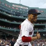 Boston Red Sox's Mookie Betts takes the field in the first inning of a baseball game against the New York Yankees in Boston, Thursday, Aug. 2, 2018. (AP Photo/Michael Dwyer)
