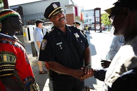 William G. Gross greeted residents during his last tour of Roxbury in uniform before being sworn in as Boston?s first black police commissioner. 
