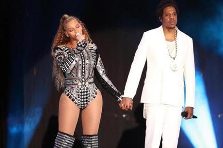 Beyoncé and Jay-Z onstage at Gillette Stadium on Sunday.

