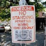 A moving truck sign on Highgate Street in Allston reserved a parking space on Sept. 1, 2016. 