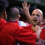 Boston, MA - 8/03/2018 - (1st inning)Boston Red Sox first baseman Steve Pearce (25) is congratulated in the Sox dugout after his 2 run home run in the first inning. The Boston Red Sox host the New York Yankees in Game 2 of a four game series at Fenway Park. - (Barry Chin/Globe Staff), Section: Sports, Reporter: Peter Abraham, Topic: 04Red Sox-Yankees, LOID: 8.4.2729609219.
