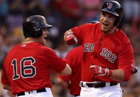Andrew Benintendi (left) and Steve Pearce played large roles in the Red Sox? four-game sweep of the Yankees.
