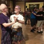 John Gintell, 79, and Robert Coren, 72, at the gender-free contra dance at the First Church in Jamaica Plain.