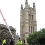 Police forensics officers worked around a silver Ford Fiesta car that was driven into a barrier at the Houses of Parliament in central London on Tuesday.