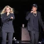 FILE - In this Nov. 4, 2016 file photo, Beyonce and Jay-Z perform during a Democratic presidential candidate Hillary Clinton campaign rally in Cleveland. During a performance on Monday, Aug. 13, 2018, Beyonce dedicated her performance with husband, Jay Z, to the Queen of Soul drawing a thunderous roar from Aretha Franklin?s hometown of Detroit. ( AP Photo/Matt Rourke, File)