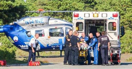 08-15-2018: Victim of possible shark attack is loaded onto helicopter. (Waiting more complete caption info.) Photo: David Curran

