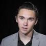 David Hogg, co-author of #NeverAgain, discusses the shooting at Marjory Stoneman Douglas High School during an interview in New York, Tuesday, June 19, 2018. Fourteen students and three staff members were fatally shot and multiple others wounded during the school massacre, on Feb. 14, 2018, in Parkland, Fla. (AP Photo/Mark Lennihan)