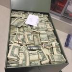 U.S. Marshals discovered and seized bundles of cash concealed in several safe deposit boxes controlled by John George, a former Dartmouth selectman and state representative. 