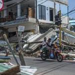 The Indonesian island of Lombok, heavily damaged by an earthquake earlier this month, was again hit by an earthquake on Sunday.