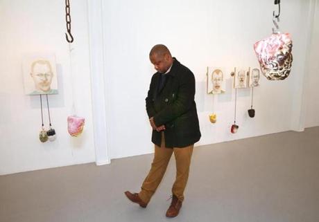 Steve Locke (pictured with one of his past exhibits) is an African-American artist, who is also one of the city of Boston?s current artists-in-residence. 
