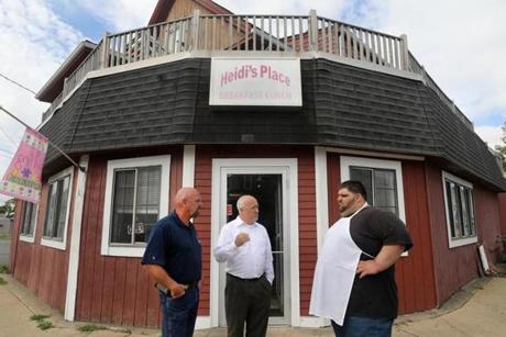 Heidi?s Place owner Alex Kosmidis (right) talked about traffic safety with Brockton Mayor Bill Carpenter (center) and DPW Commissioner Larry Rowley.
