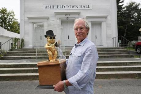 Harry Keramidas, a veteran of the movie business, was instrumental in getting the Ashfield Film Festival off the ground. He?s holding the mascot, Baby Cecil. 
