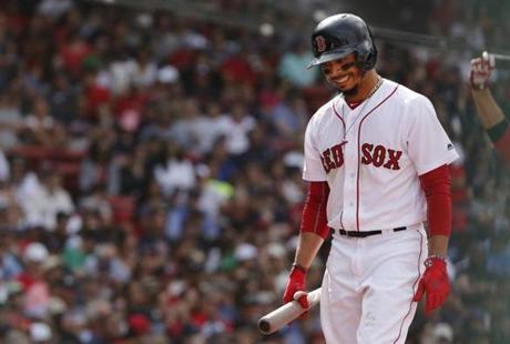 Boston, MA--8/19/2018-- Red Sox Mookie Betts reacts after striking out against Tampa Bay during the ninth inning at Fenway Park. (Jessica Rinaldi/Globe Staff) Topic: RedSox-Rays Reporter: 
