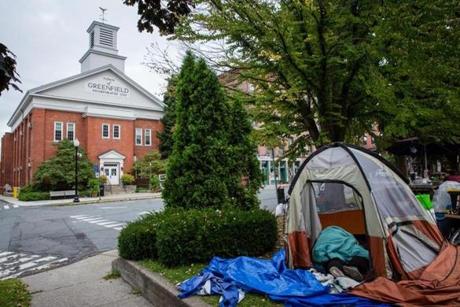 Tents used by homeless people on Greenfield?s common have been removed on orders of Mayor William F. Martin.

