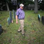 Stoneham, MA - 07/26/18 - Ben Jacques (cq) walks among the graves. The Old Burying Ground in Stoneham holds unmarked graves of slaves of prominent Stoneham families. (Lane Turner/Globe Staff) Reporter: (osen) Topic: (29zoslavery)