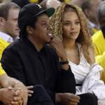 A fan rushed the stage Saturday during a concert featuring Jay-Z and Beyoncé, Atlanta police said.