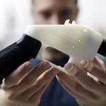 Cody Wilson of Defense Distributed held a 3D-printed gun known as the Liberator. 