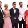 (From L) Actor Jason Clarke, actress Olivia Hamilton, director Damien Chazelle, actor Ryan Gosling and actress Claire Foy pose as they arrive for the opening ceremony and the premiere of the film 