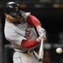 Boston Red Sox's Mookie Betts hits a two-run home run against the Chicago White Sox during the seventh inning of a baseball game Thursday, Aug. 30, 2018, in Chicago. (AP Photo/Jim Young)