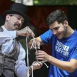 Joe Cautela (right) of Hudson assisted magician David Hagerman with a rope trick at Canobie Lake Park in Salem, N.H., during a late August performance.  