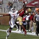 Chestnut Hill, MA - 9/01/2018 - (1st quarter) Boston College Eagles wide receiver Kobay White (9) pulls in a reception over UMass Minutemen cornerback Lee Moses during a first quarter drive for a touchdown. Boston College Eagles vs. University of Massachusetts Minutemen at Alumni stadium in Chestnut Hill. - (Barry Chin/Globe Staff), Section: Sports, Reporter: Julian Benbow, Topic: 01BC-UMass, LOID:8.4.2982354795.