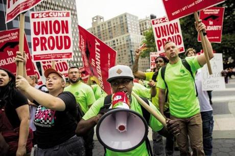 NEW YORK, NY - JUNE 27: Union activists and supporters rally against the Supreme Court's ruling in the Janus v. AFSCME case, in Foley Square in Lower Manhattan, June 27, 2018 in New York City. In a 5-4 decision, the Supreme Court ruled on Wednesday that public employee unions cannot require non-members to pay fees. The ruling will have significant financial impacts for organized labor. (Photo by Drew Angerer/Getty Images)
