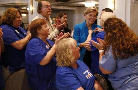 US Senator Elizabeth Warren accepted a pin from a group representing nurses at the Greater Boston Labor Council's Annual Labor Day Breakfast on Monday.  
