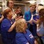US Senator Elizabeth Warren accepted a pin from a group representing nurses at the Greater Boston Labor Council's Annual Labor Day Breakfast on Monday.  