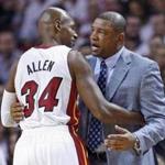 Boston Celtics head coach Doc Rivers (R) greets new Miami Heat player Ray Allen during their NBA basketball game in Miami, Florida, October 30, 2012. Allen formerly played for the Celtics. REUTERS/Andrew Innerarity (UNITED STATES - Tags: SPORT BASKETBALL)