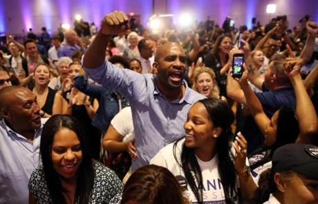 Supporters cheered during the Ayanna Pressley victory party. 
