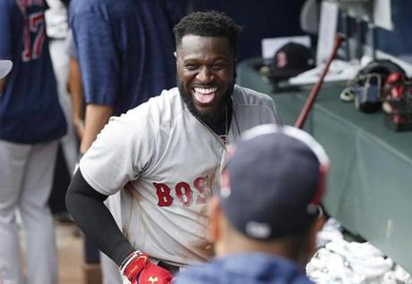 Boston Red Sox Brandon Phillips celebrates in the dugout after hitting a two-run home run in the ninth inning of baseball game against the Atlanta Braves Wednesday, Sept. 5, 2018, in Atlanta. Boston won 9-8. (AP Photo/John Bazemore)
