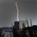 A lightning bolt could be seen over Columbia Point near the campus of UMass Boston on Thursday. 