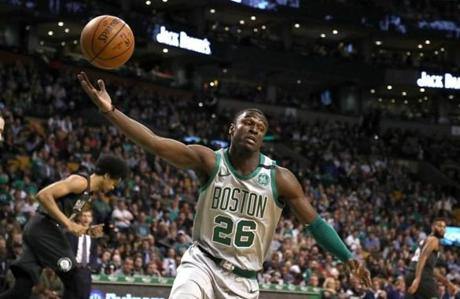 Boston MA 4/11/18 Boston Celtics Jabari Bird hauls in a defensive rebound against the Brooklyn Nets during first quarter action at the TD Garden. (photo by Matthew J. Lee/Globe staff) topic: reporter:
