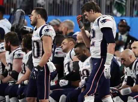 Minneapolis, MN - 2/4/2018 - The Patriots bench is not a happy place in the fourth quarter, including quarterback Tom Brady (12) and some of his teammates, including Danny Amendola (80), and Rob Gronkowski in the backround during Super Bowl LII. The New England Patriots play the Philadelphia Eagles in Super Bowl LII at US Bank Stadium in Minneapolis on Feb. 4, 2018. (Jim Davis/Globe staff 
