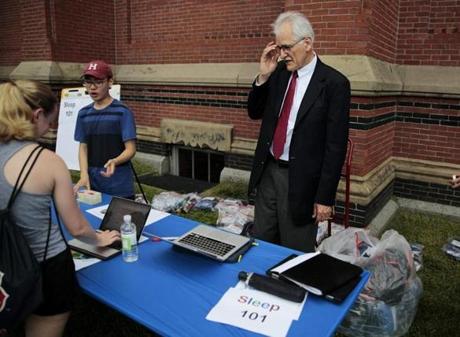 Raymond So (left), a sophomore at Harvard, and Charles Czeisler, professor of sleep medicine, talked to freshmen about the importance of sleep and the lack thereof on the Harvard campus last month.
