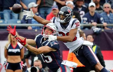 PATRIOT SLIDER Foxborough, MA- 9/9/18 - Houston Texans Kevin Johnson is called for pass interference and he holds New England Patriots Chris Hogan during the 3rd quarter of the home opener at Gillette Stadium. (Matthew J. Lee/Globe staff)

