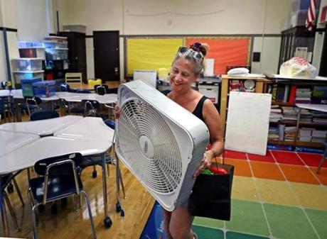BOSTON, MA - 9/04/2018: HOT CLASSROOM....Getting ready for school opening on Thursday, Meg Goodwin, a fourth grade teacher brought her own fan to her classroom that is needed to help with Boston's humid temperatures at the Thomas Edison School in Allston. The school has no air conditioning. (David L Ryan/Globe Staff ) SECTION: METRO TOPIC stand alone photo
